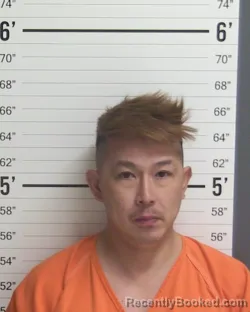 Mugshot of MINH CAO NGUYEN booked in Curry County, New Mexico on May 6, 2026