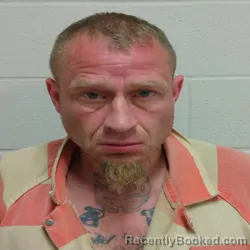 Mugshot of JUSTIN ALAN DANIELL booked in Brown County, Texas on March 24, 2026