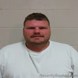 Mugshot of JOHN JACOBUS KARAKARIS booked in Brown County, Texas on April 25, 2026