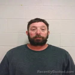 Mugshot of JUSTIN RAY WHITE booked in Brown County, Texas on May 9, 2026