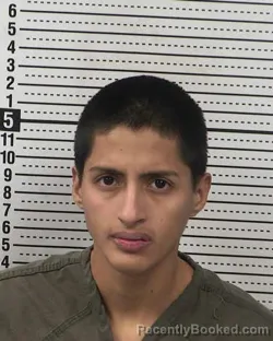 Mugshot of JUSTIN PINA-QUINGALAHUA