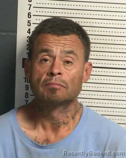 Mugshot of JESUS JUNIOR DELGADO