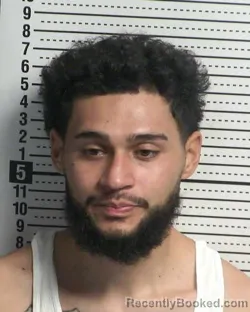 Mugshot of IBAN TORRES booked in Dona Ana County, New Mexico on March 21, 2026