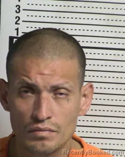 Mugshot of MIGUEL GARCIA booked in Dona Ana County, New Mexico on March 21, 2026