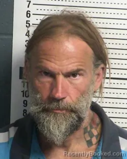 Mugshot of JASON MICHAEL SURRENCY booked in Dona Ana County, New Mexico on March 23, 2026