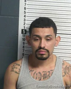 Mugshot of CARLOS D ESCOBEDO booked in Dona Ana County, New Mexico on March 26, 2026