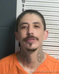 Mugshot of CHRISTOPHER ANGEL MANCHA booked in Dona Ana County, New Mexico on March 26, 2026