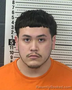Mugshot of MIGUEL ENRIQUEZ booked in Dona Ana County, New Mexico on March 28, 2026