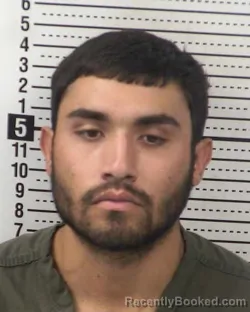 Mugshot of OMAR MARTINEZ-GONZALEZ booked in Dona Ana County, New Mexico on April 1, 2026