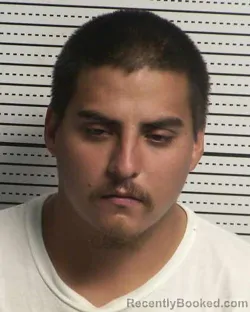 Mugshot of CARLOS MICHAEL SANCHEZ booked in Dona Ana County, New Mexico on April 7, 2026