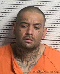 Mugshot of MATTHEW ENRIQUEZ booked in Dona Ana County, New Mexico on May 4, 2026