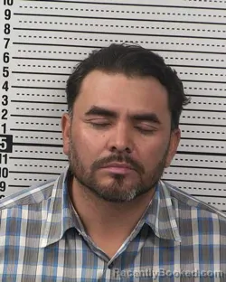 Mugshot of JUAN QUINONES FLORES booked in Dona Ana County, New Mexico on May 6, 2026