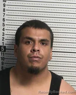 Mugshot of JONATHAN RAY ESPARZA booked in Dona Ana County, New Mexico on May 11, 2026