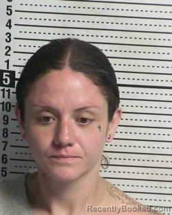 Mugshot of COURTNEY JEANETTE MADRID booked in Dona Ana County, New Mexico on May 11, 2026