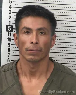 Mugshot of JAVIER PERALTA-REYES booked in Dona Ana County, New Mexico on May 12, 2026