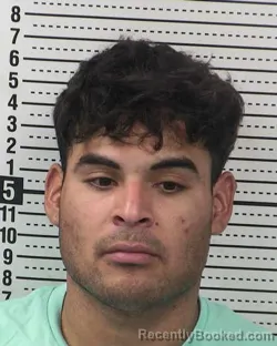 Mugshot of AXEL HERRERA-USCANGA booked in Dona Ana County, New Mexico on May 13, 2026