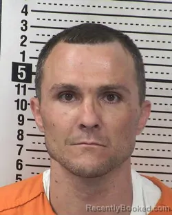 Mugshot of KELLEY JACOB MANSUR booked in Dona Ana County, New Mexico on May 13, 2026