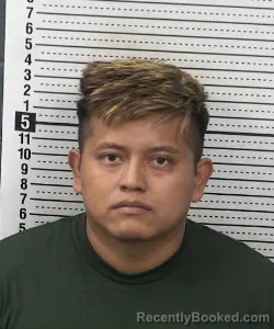 Mugshot of JOSE MENESES-JIMENEZ booked in Dona Ana County, New Mexico on July 8, 2026