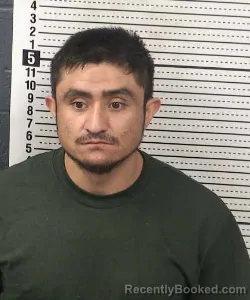Mugshot of CARMELO CONTRERAS-FLORES booked in Dona Ana County, New Mexico on July 8, 2026