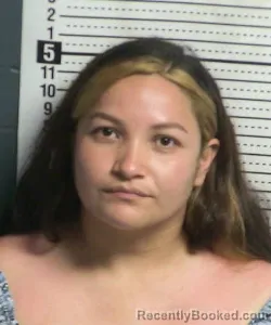 Mugshot of CHRISTINA JULIETA MARTINEZ booked in Dona Ana County, New Mexico on July 12, 2026