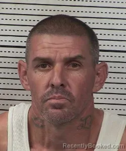 Mugshot of JUSTIN R DOMINGUEZ booked in Dona Ana County, New Mexico on July 13, 2026