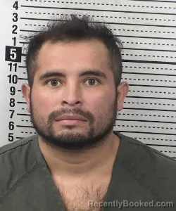 Mugshot of CRISTIAN GARCIA-MORALES booked in Dona Ana County, New Mexico on July 17, 2026