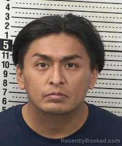 Mugshot of Miguel Hinojosa-Molina booked in Dona Ana County, New Mexico on July 27, 2026