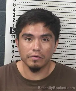 Mugshot of Jose Alonzo Guevara booked in Dona Ana County, New Mexico on August 23, 2026