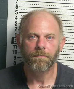 Mugshot of Kasey Devin Thompson booked in Dona Ana County, New Mexico on August 25, 2026