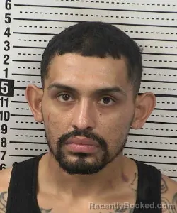 Mugshot of Carlos Derek Escobedo booked in Dona Ana County, New Mexico on August 26, 2026