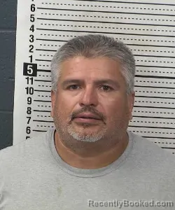 Mugshot of Miguel Enriquez booked in Dona Ana County, New Mexico on August 28, 2026