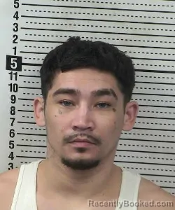Mugshot of Angelo Rey Espinosa booked in Dona Ana County, New Mexico on September 16, 2026