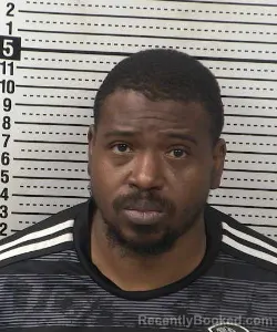 Mugshot of Kwame Ronald Lamar Flucas booked in Dona Ana County, New Mexico on October 23, 2026