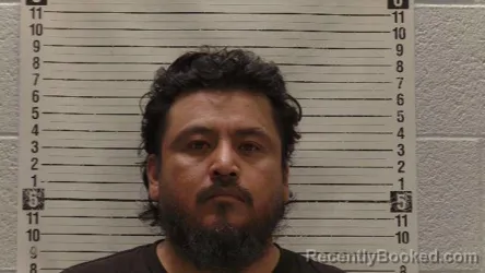 Mugshot of SANTIAGO FLORES-FLORES booked in Luna County, New Mexico on April 7, 2026