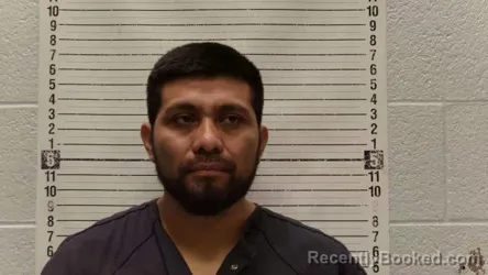 Mugshot of ROEL SANTOS-JIMENEZ booked in Luna County, New Mexico on July 20, 2026