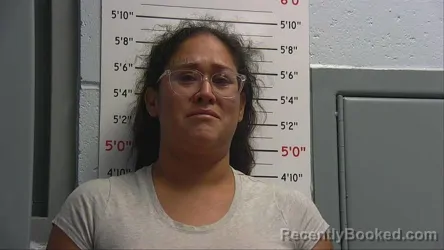 Mugshot of MAXINE MONIQUE HOPKINS booked in Sandoval County, New Mexico on April 22, 2026