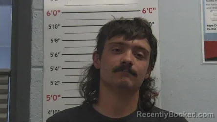 Mugshot of CALEB REGAN ROSADO booked in Sandoval County, New Mexico on July 2, 2026