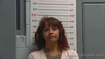 Mugshot of VALERIE CORONEL booked in Sandoval County, New Mexico on July 23, 2026