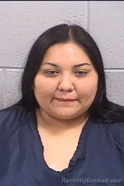 Mugshot of Jaime Erica Buck booked in San Juan County, New Mexico on August 14, 2026