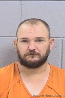 Mugshot of Corey Charles Scott booked in San Juan County, New Mexico on April 24, 2026