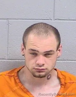 Mugshot of Christian Jeremiah Simons booked in San Juan County, New Mexico on April 27, 2026