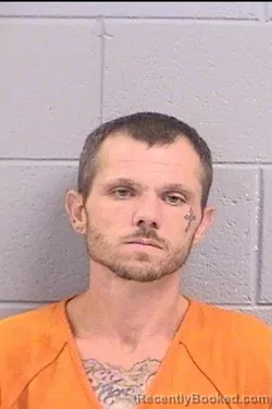 Mugshot of Justin James Giles booked in San Juan County, New Mexico on May 26, 2026