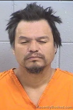 Mugshot of Merle Gene Daukei