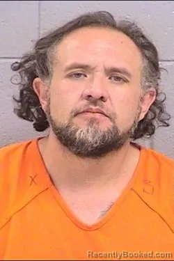 Mugshot of Apollo Petiskavias Derizotis booked in San Juan County, New Mexico on July 27, 2026