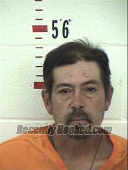 Booking photo from San Miguel County, New Mexico