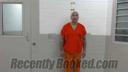 Booking photo from San Miguel County, New Mexico