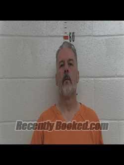 Booking photo from San Miguel County, New Mexico