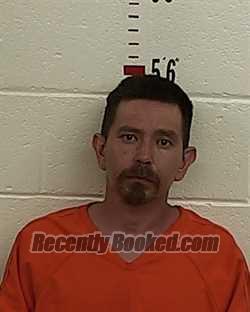 Booking photo from San Miguel County, New Mexico