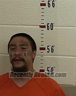 Booking photo from San Miguel County, New Mexico