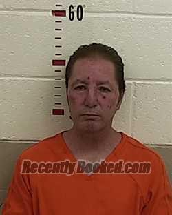 Booking photo from San Miguel County, New Mexico